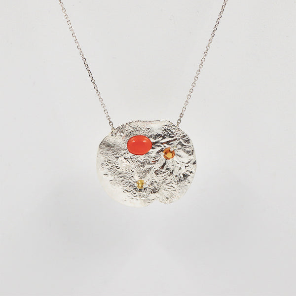 Collier pendentif "minéral" en argent et quatre pierres fines